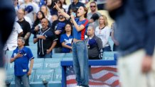 LOS ANGELES, CALIFORNIA - JUNE 14: Nezza sings the national anthem in Spanish before a baseball game between the Los Angeles Dodgers and San Francisco Giants at Dodger Stadium on June 14, 2025 in Los Angeles, California. (Photo by Kevork Djansezian/Getty Images)